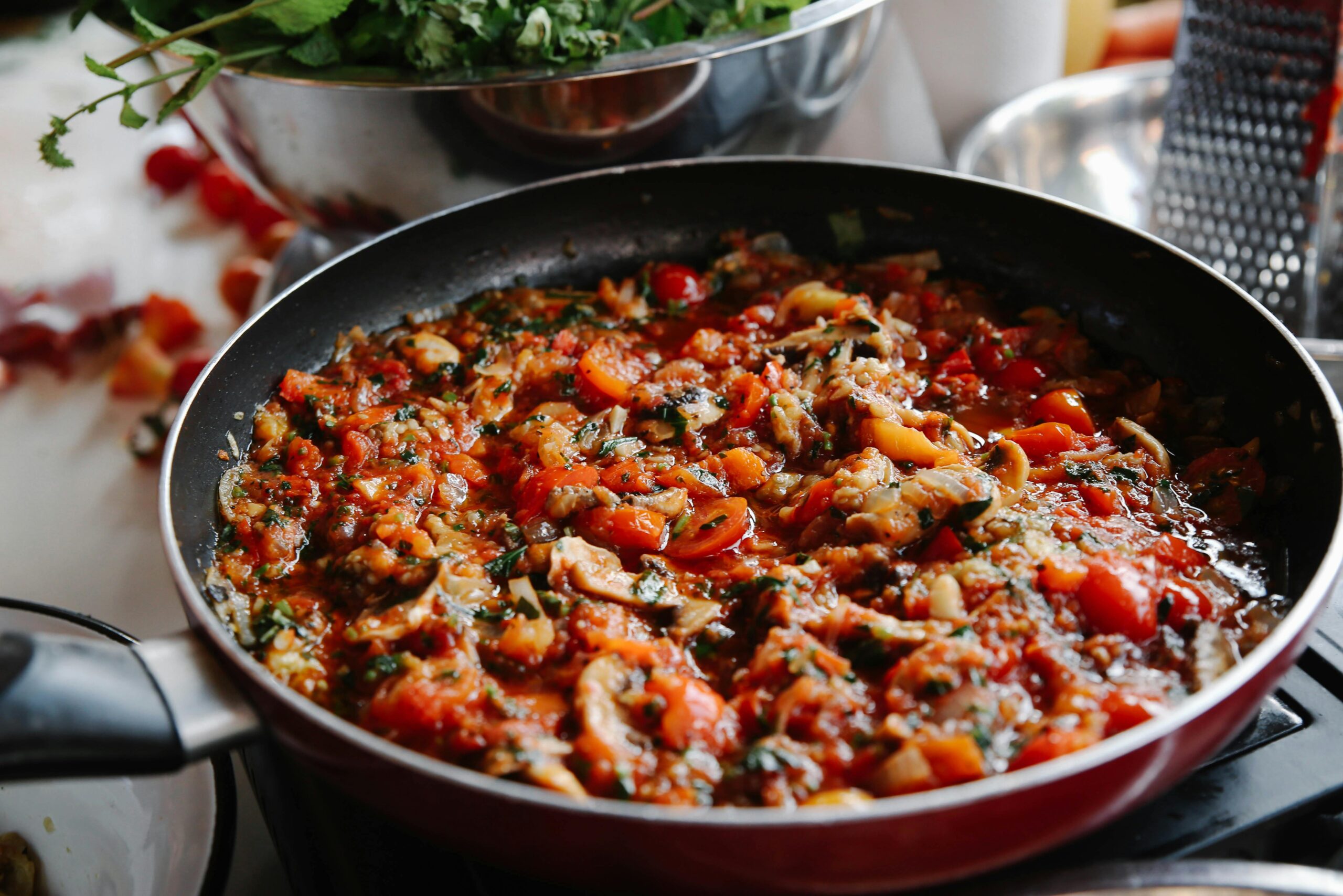 Wild mushroom zaalouk with Moroccan spices served in a bowl, garnished with fresh cilantro.